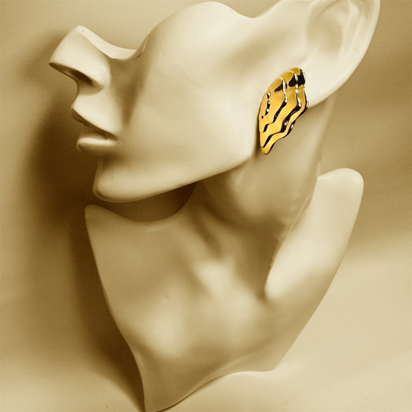 Avon Wavy Butterfly Clip On Earrings